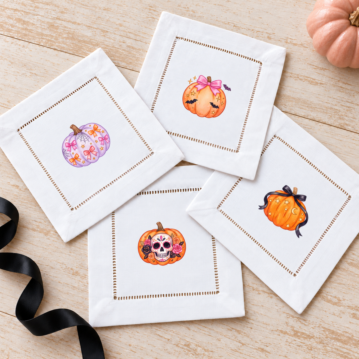 Girlie Halloween Pumpkins Set 1 — mini pumpkin transfers on white hemstitched cocktail napkins