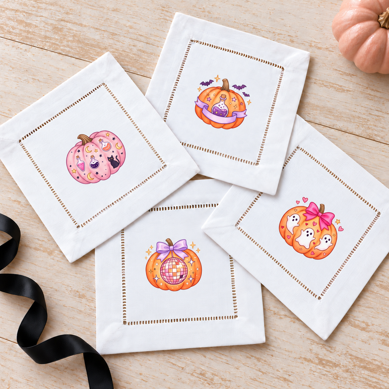 Girlie Halloween Pumpkins Set 2 — mini pumpkin transfers on white hemstitched cocktail napkins