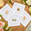 Mahjong Mahj Magic: four designs on white hemstitched cocktail napkins