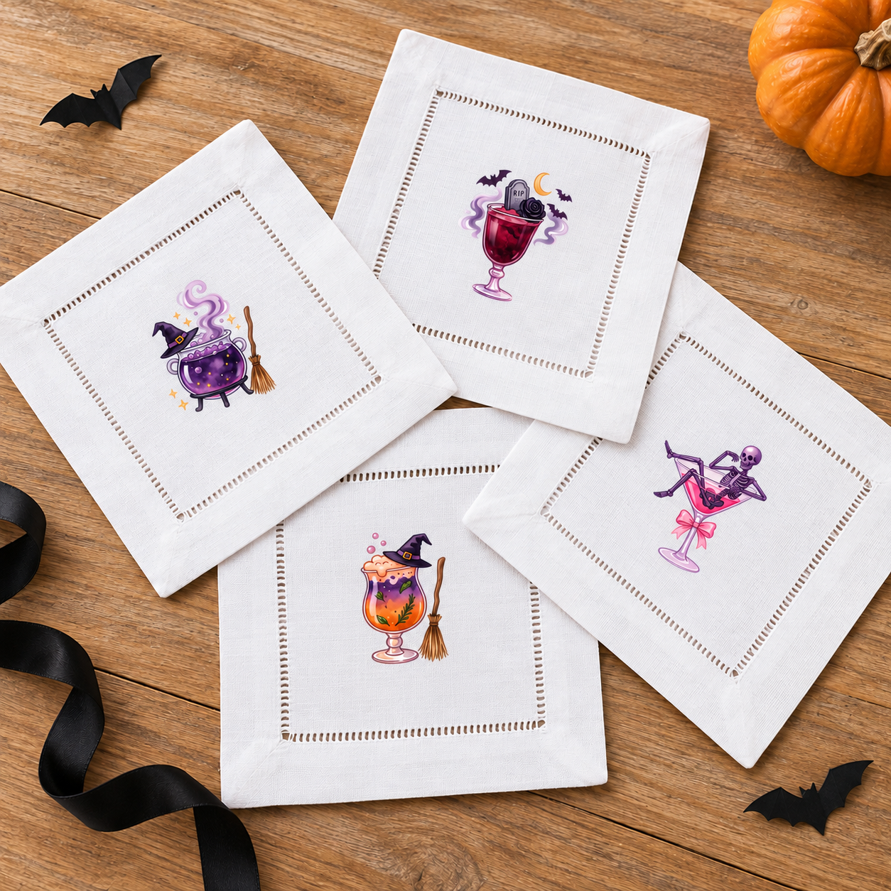 Halloween Cocktails 1 - four mini DTF transfer designs shown on white hemstitched cocktail napkins