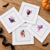 Halloween Cocktails 1 - four mini DTF transfer designs shown on white hemstitched cocktail napkins