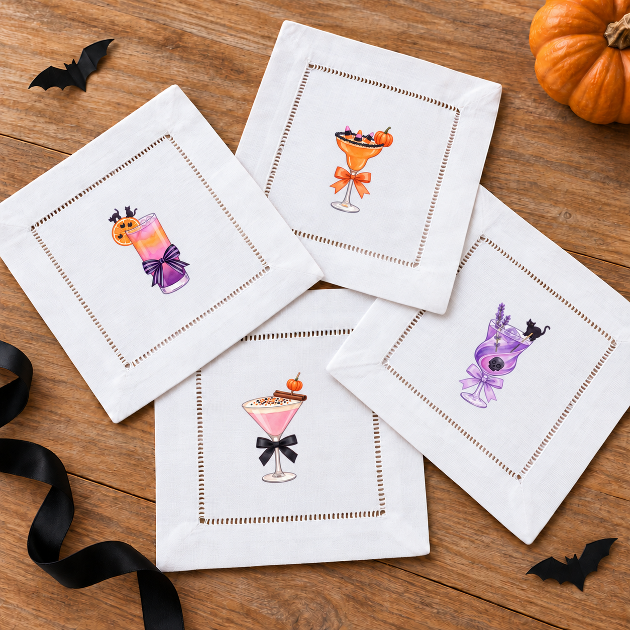 Halloween Cocktails 3 - four mini DTF transfer designs shown on white hemstitched cocktail napkins