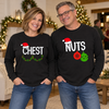 Couple wearing CHEST and NUTS Christmas transfers on black long-sleeve tees