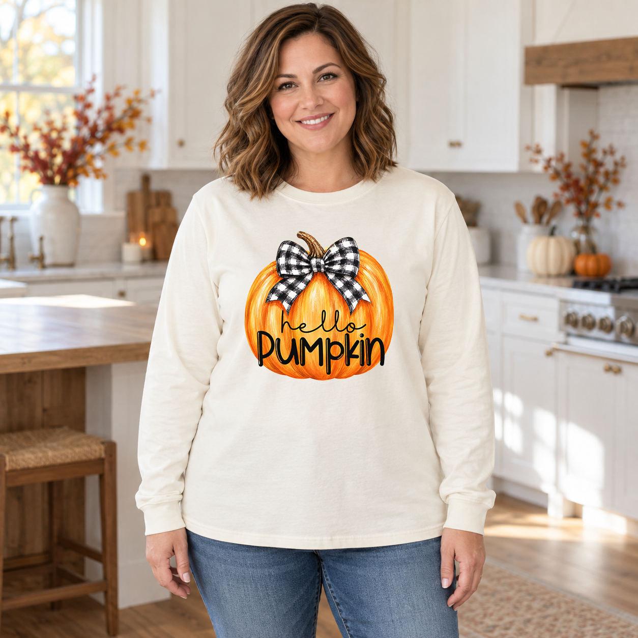 Hello Pumpkin Gingham Bow transfer shown on a white sweatshirt