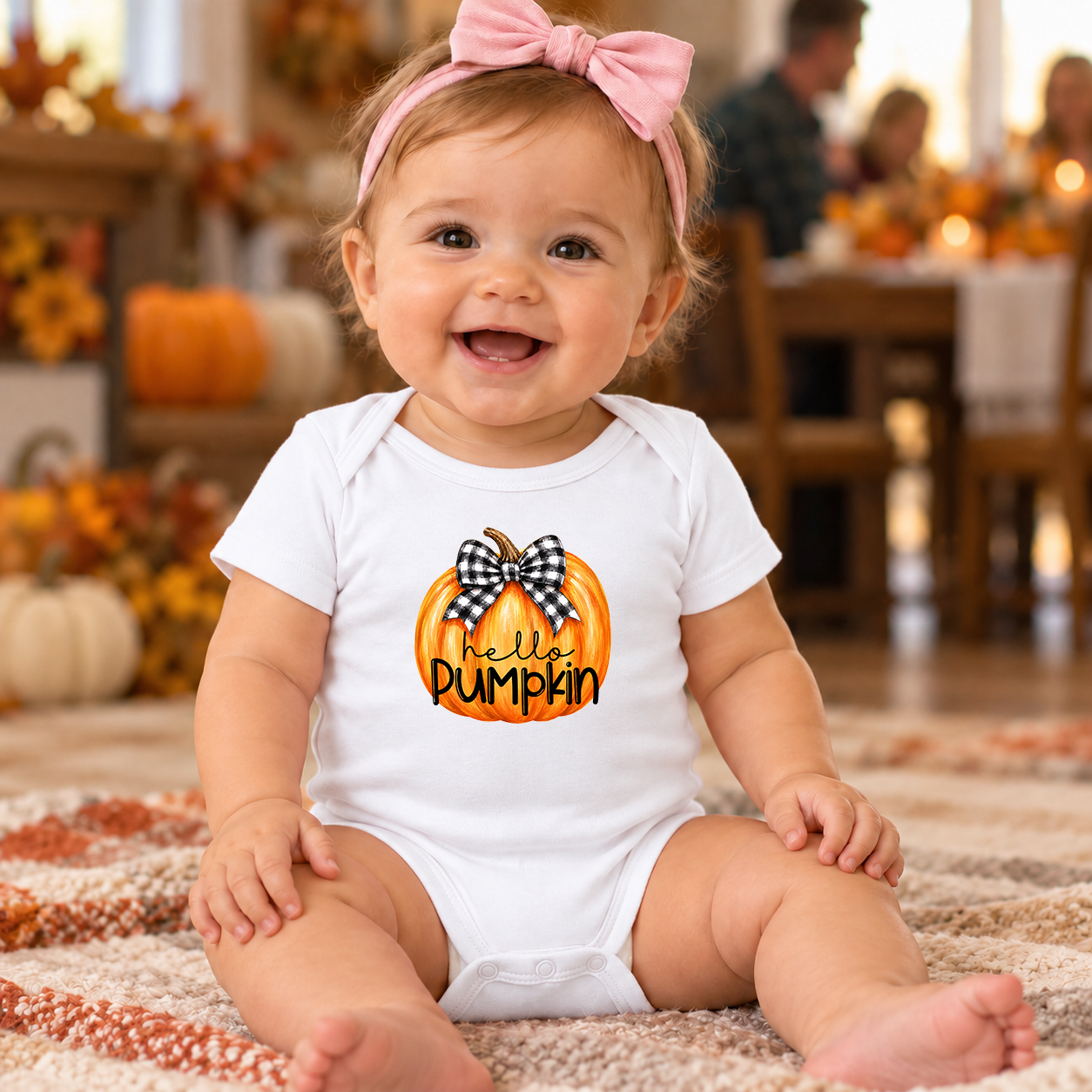 Hello Pumpkin Gingham Bow transfer shown on a baby onesie