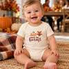 Baby wearing a Natural onesie with I'll Just Have The Breast Thanksgiving turkey transfer