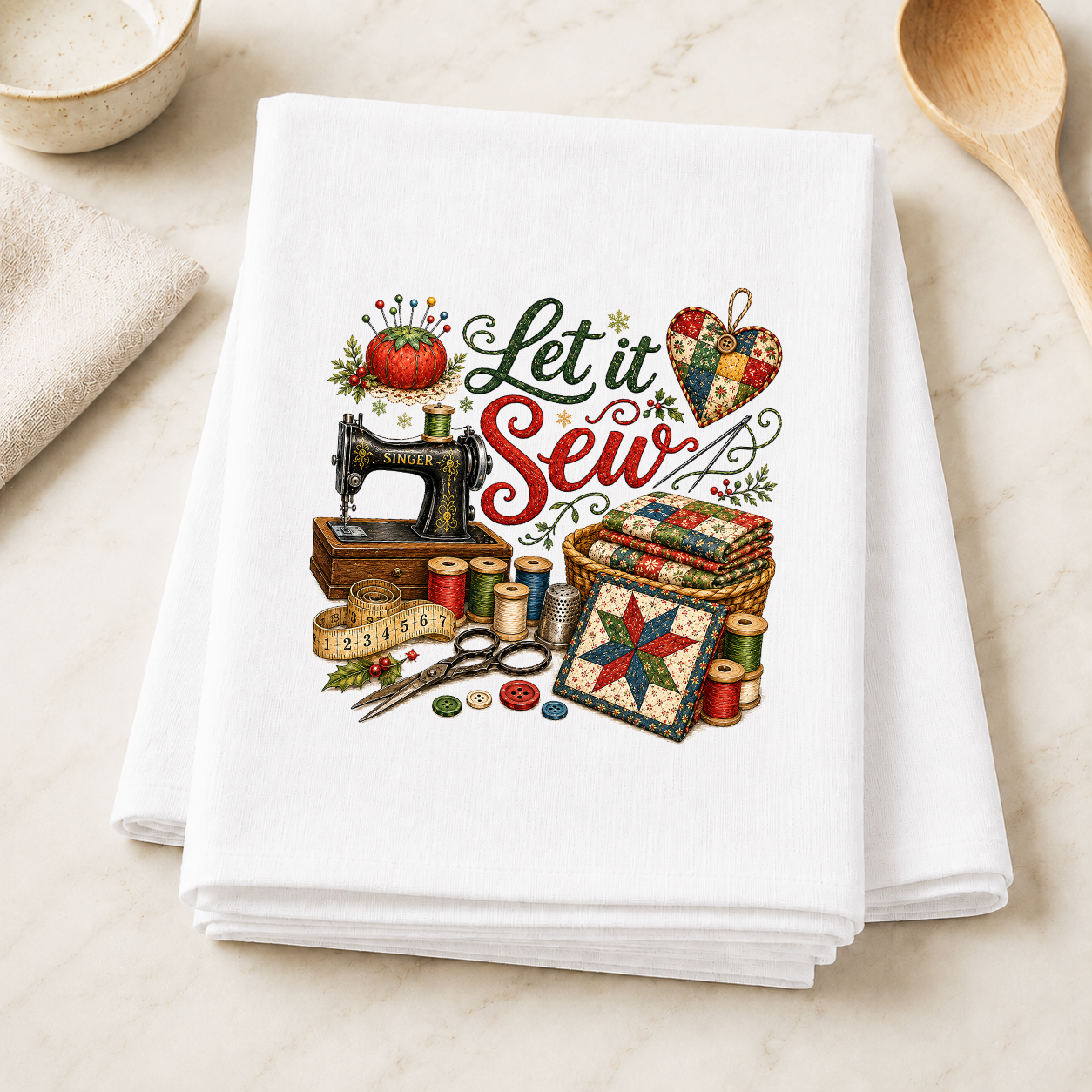 Let It Sew Christmas Quilting transfer on a smooth neatly folded white kitchen towel