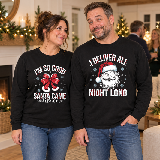 Couple wearing coordinating Santa Came Twice and I Deliver All Night Long designs on black long-sleeve tees