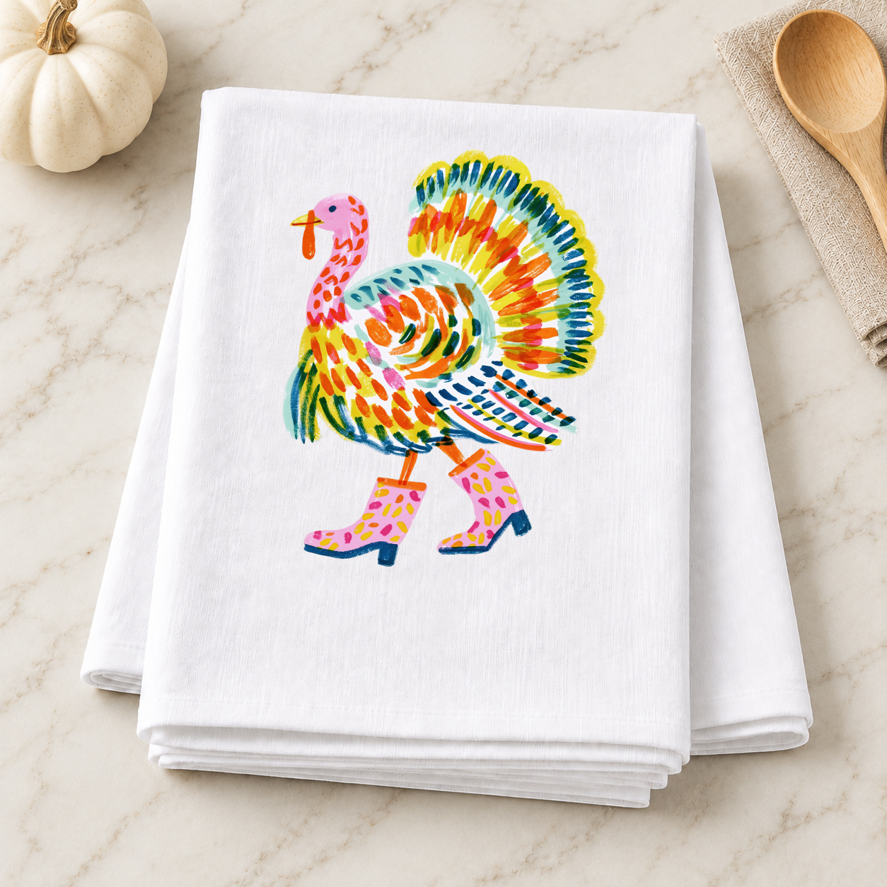 Preppy Turkey in pink boots on a folded white kitchen towel