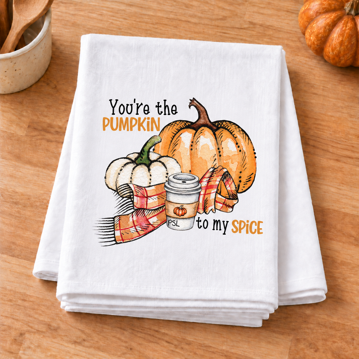 Pumpkin To My Spice transfer on a folded white towel in a fall kitchen