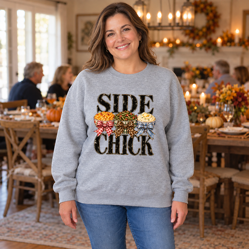 Woman wearing a grey sweatshirt with Side Chick Thanksgiving transfer