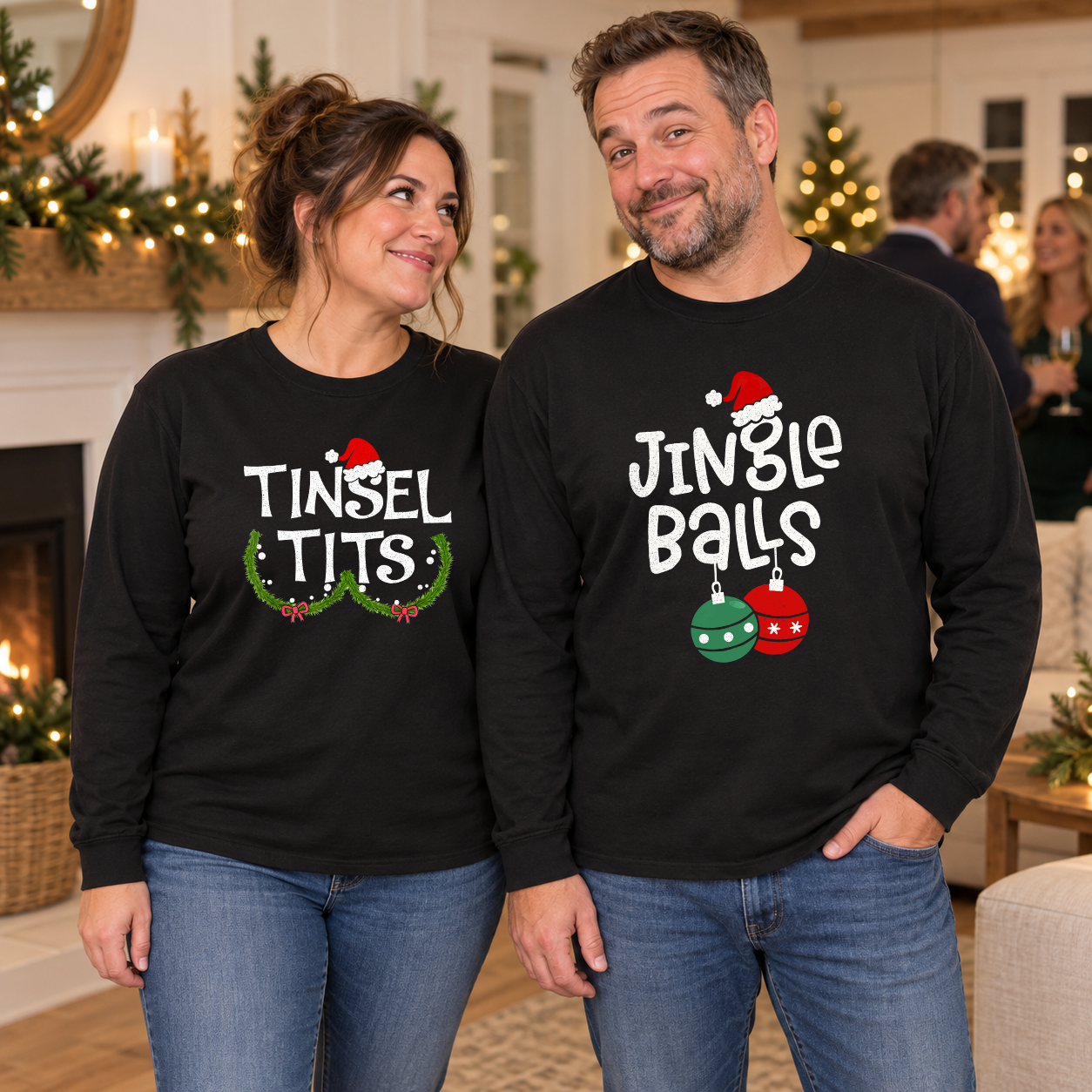 Couple wearing Tinsel Tits and Jingle Balls designs on black long-sleeve tees at a Christmas party